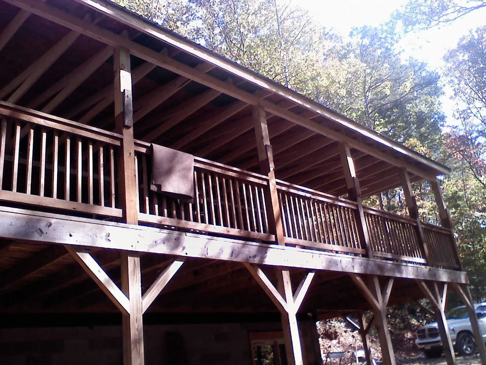 Timber framing under a new elevated porch and deck — Roof Leak Repair in Provo by Roofing Brothers